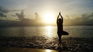 beach, yoga, sunset, silhouette, person, yoga pose, shore, seashore, nature, sea, ocean, meditate, meditation, pose, balance, calm, tranquil